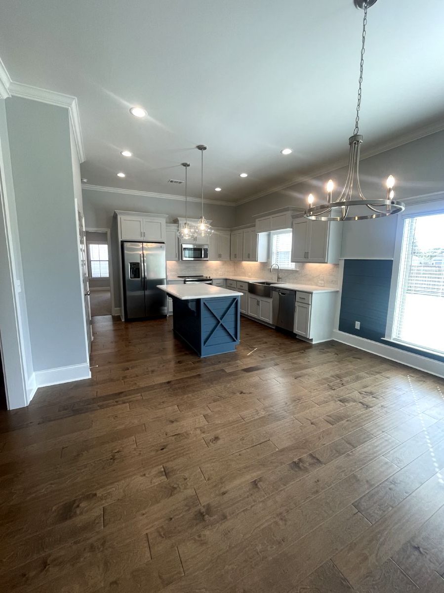 Mixon Floor Plan Custom Homes Living area and kitchen