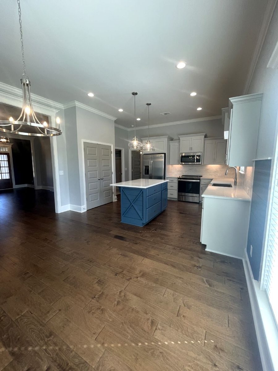 Mixon Floor Plan Custom Homes living area and kitchen