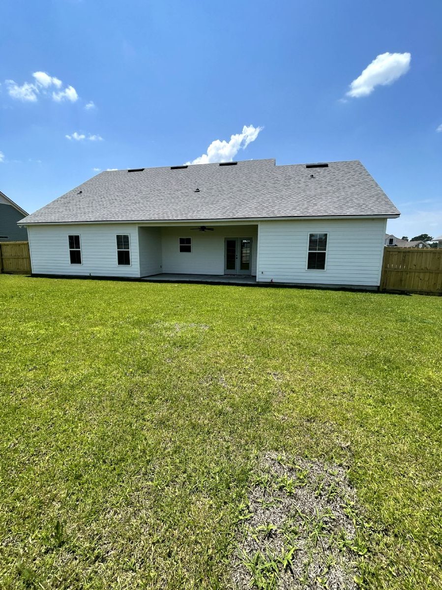 Eagle Floor Plan Custom Built Home Backyard