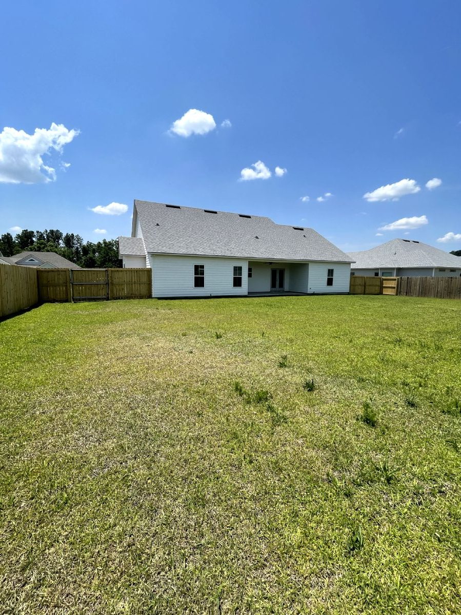 Eagle Floor Plan Custom Built Home Backyard