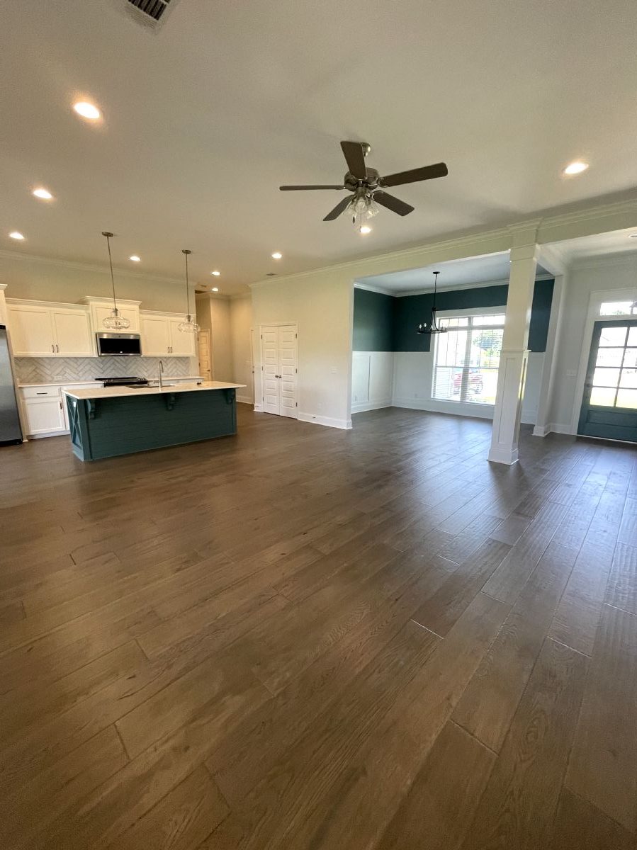 Sweet Pecan Custom Home Living Area and Kitchen Open Floor Plan