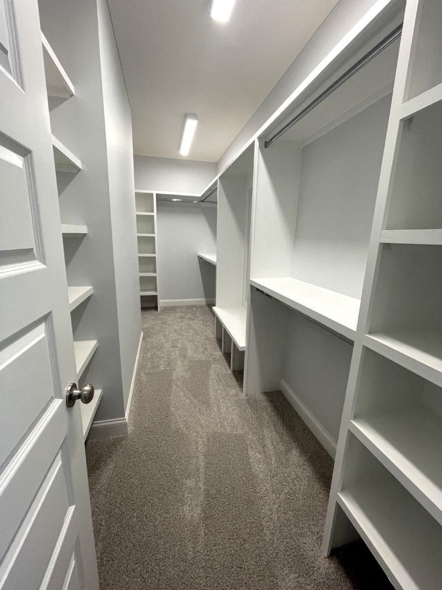 Sweet Pecan Custom Home Master Bathroom Closet