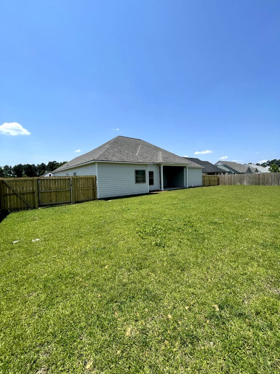 Sweet Pecan Custom Home Backyard