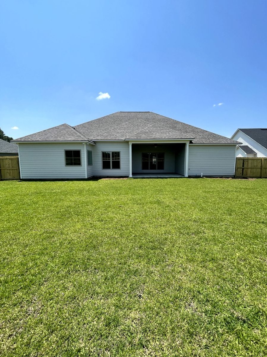 Sweet Pecan Custom Home Backyard